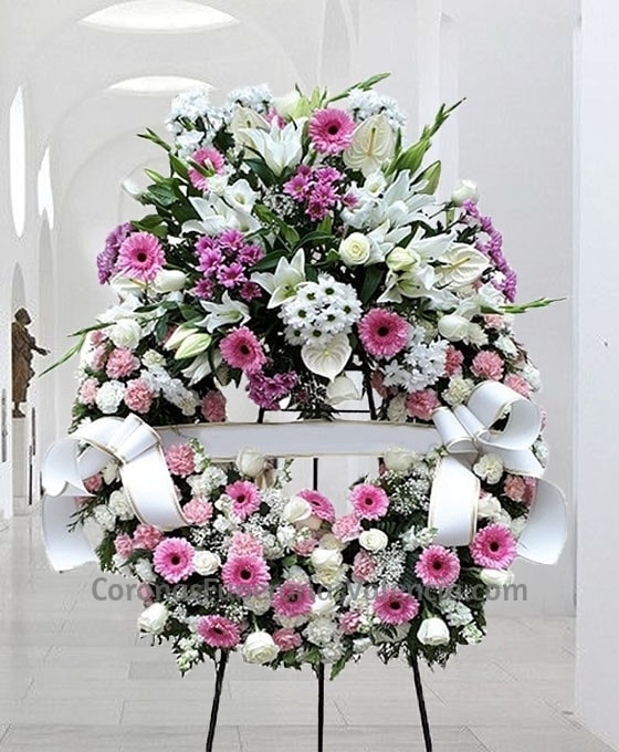 Corona funeraria variada en tonos rosas y blancos